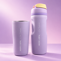 A matching insulated travel tumbler and water bottle set in a soft lavender-purple color, featuring the vertical white text 'MODE & OPAL x Klein CGFashion' on both items, set against a matching purple gradient background.